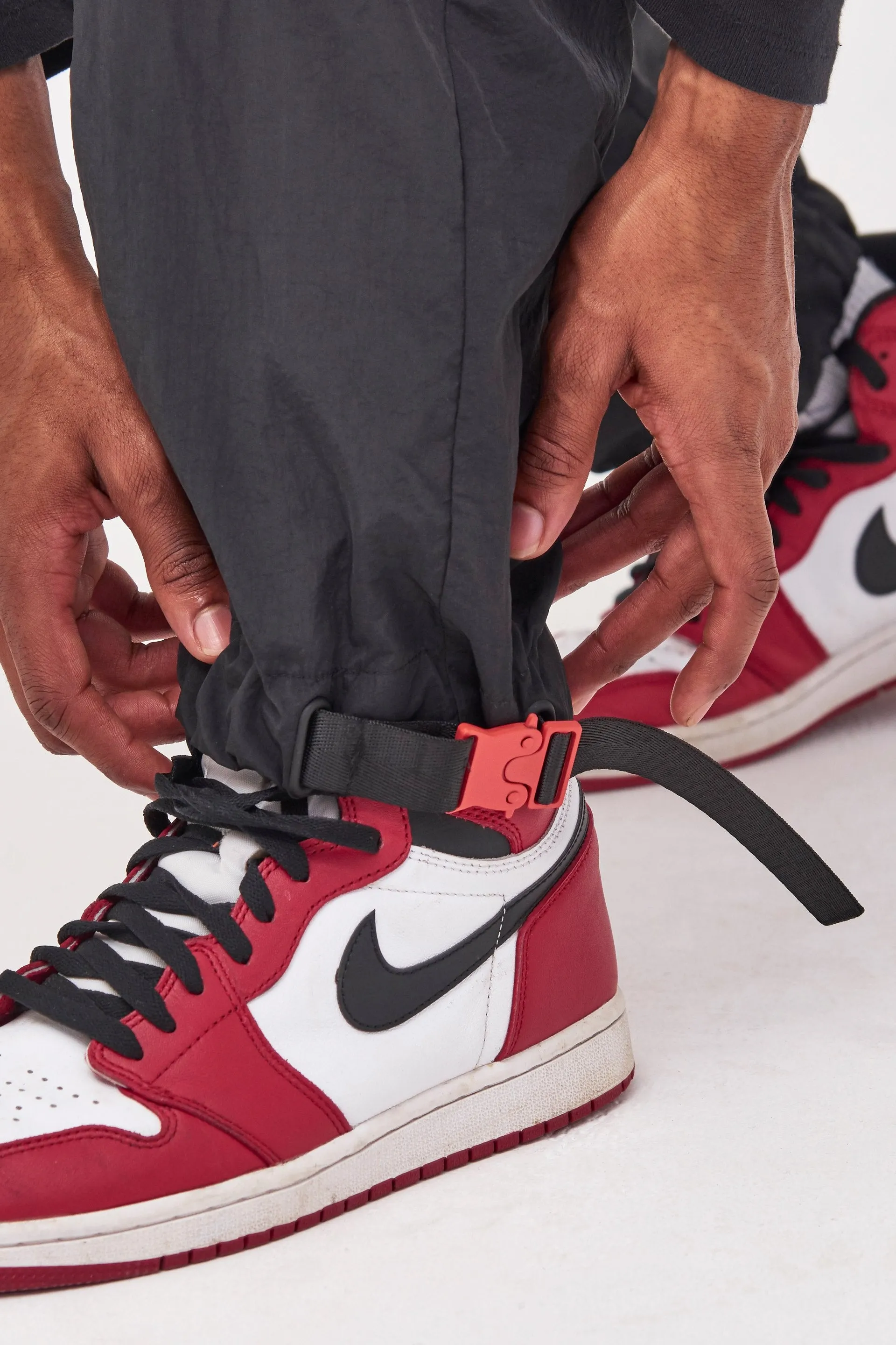 Black Nylon Joggers With Red Stitching Detail