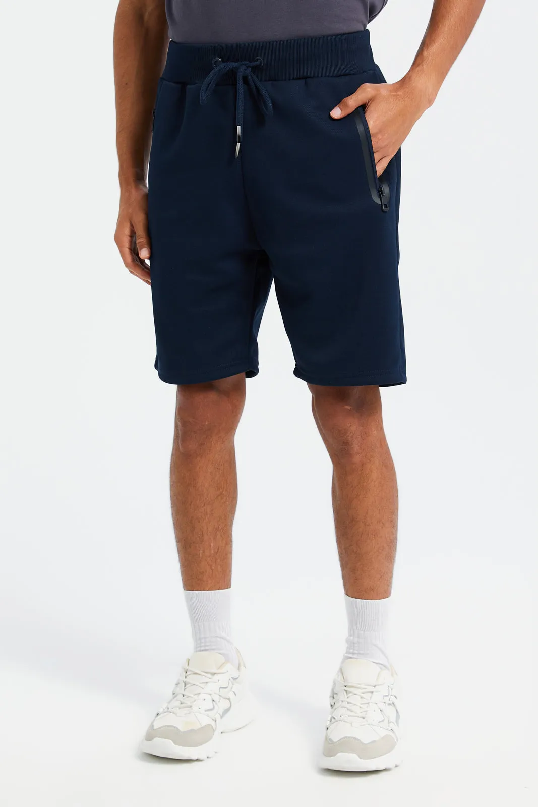 Men Navy Mid Rise Tech Shorts With Zip Pockets
