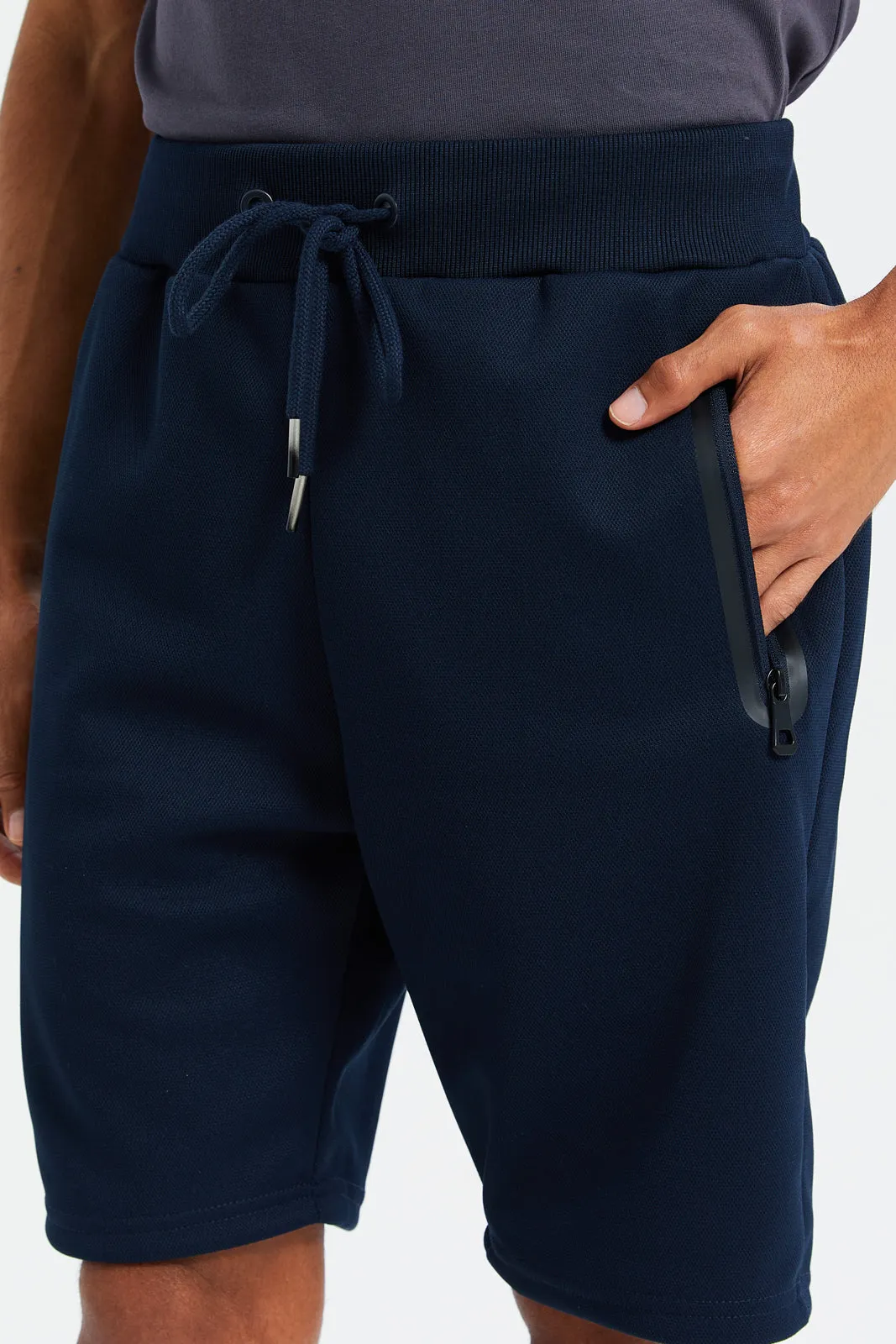Men Navy Mid Rise Tech Shorts With Zip Pockets